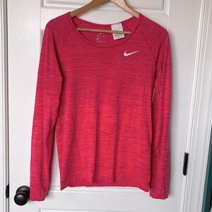 Nike medium dri fit running top.